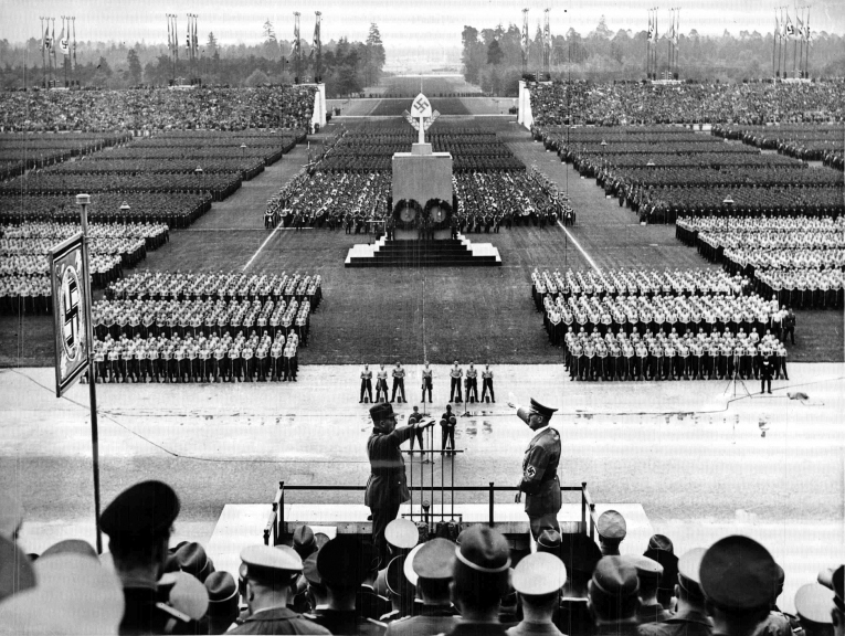 Adolf Hitler salutes Konstantin Hierl at the formations of the Reich Labour Service parade